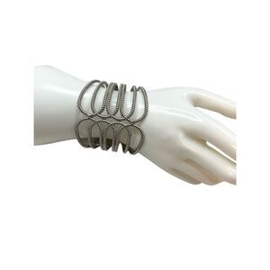Silver hinged wrapped cuff bracelet